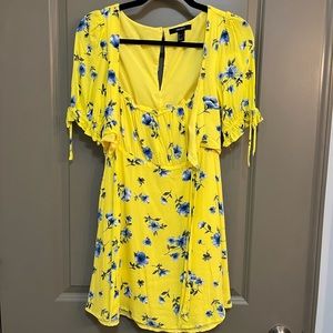 Yellow dress with blue flowers